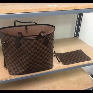 Louis Vuitton Neverfull bag with clutch